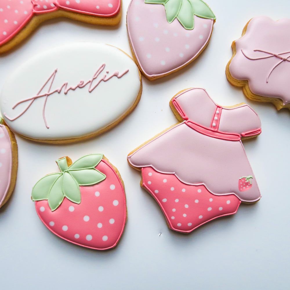 Personalised Amelia birthday sugar cookies with strawberry details