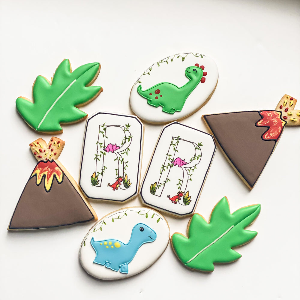Hand-decorated dinosaur party sugar cookies