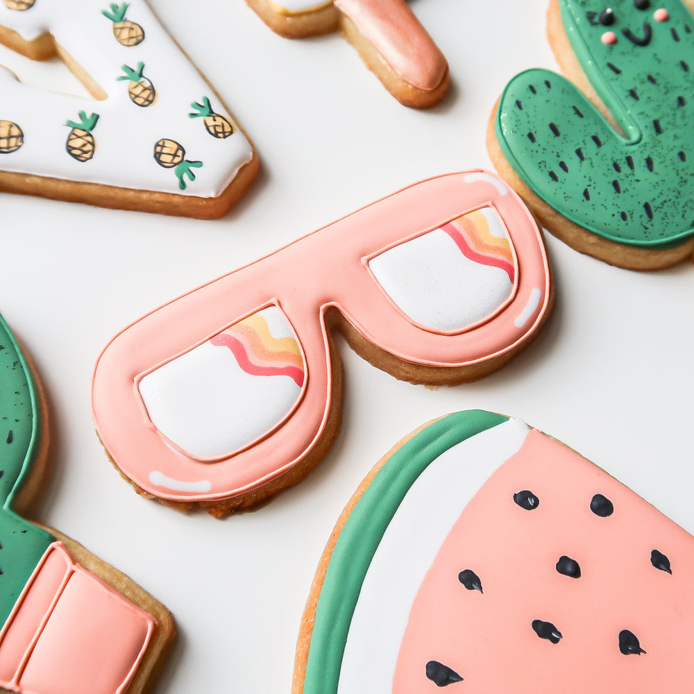 Pastel sunglasses and watermelon sugar cookies