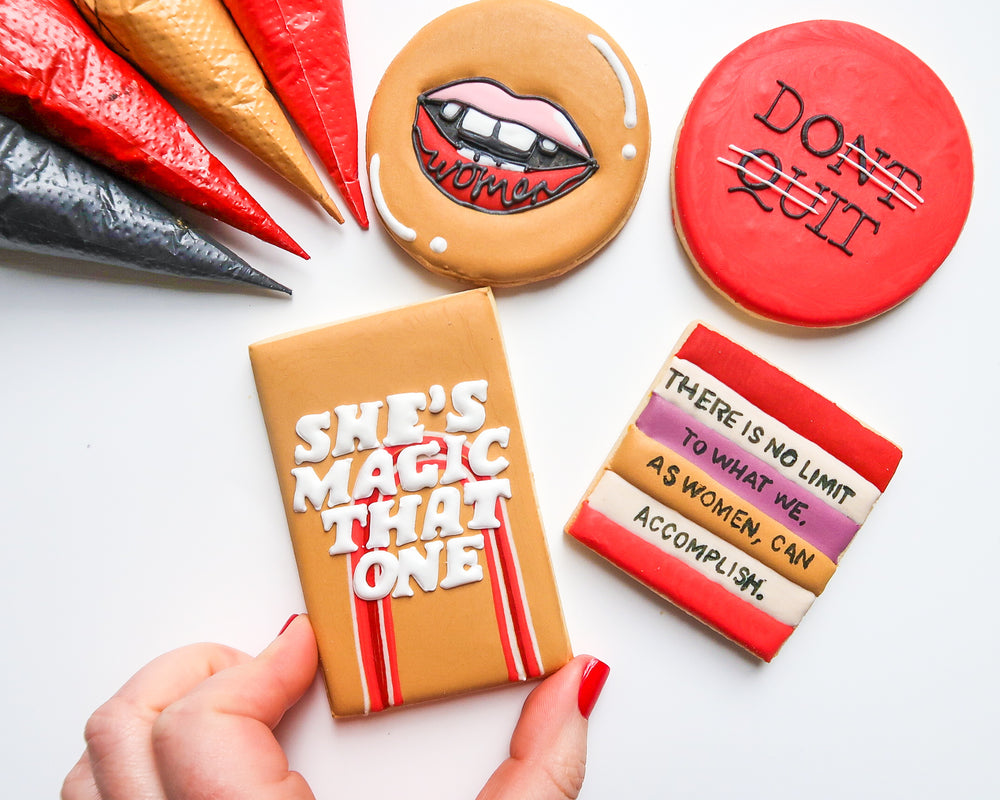 Hand-decorated sugar cookies with empowering messages